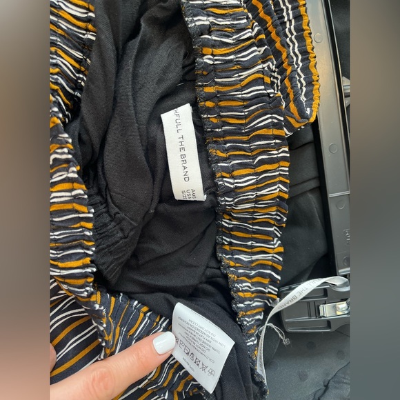 Faithfull the Label Two Piece Set: Cropped Flowy Strapless Top with Flare Pants - Picture 5 of 6